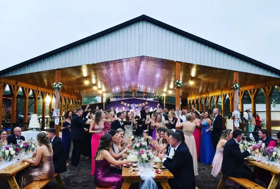 Guests at a reception under the Lakeside Pavilion